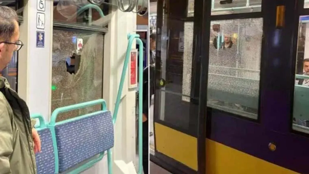 Tramvaya akılalmaz saldırı: İçinde yolcular varken taş atıp camını kırdı