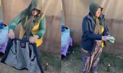 Sosyal medya bu videoyu konuşuyor! Depremzede yardım gelen montun cebine bakınca...