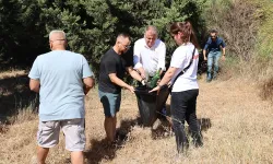 Urla'da duyarlı etkinlik: Yangın bölgesinde orman temizliği yapıldı
