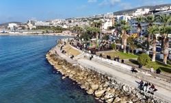 Kuşadası'nda kışa veda! Sıcak hava sahili canlandırdı