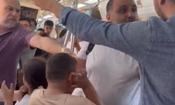 Çocuklarıyla seyahat eden babayı darbetmişti: Tutuklandı