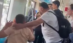 Marmaray'da yer verme tartışması: Çocuklarının yanında yumruk attılar