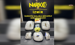 İzmir'de durdurulan araçta 15 kilo uyuşturucu bulundu
