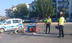 İzmir'de otomobille çarpışan motosikletin sürücüsü yaralandı