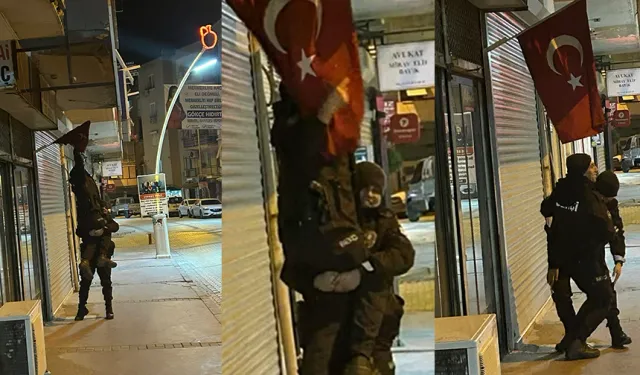 İzmir'de dolanan bayrağı düzelten bekçilere plaket