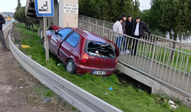 İzmir'de korkunç kaza: Otomobil üst geçide çarptı, 1 ölü 1 yaralı