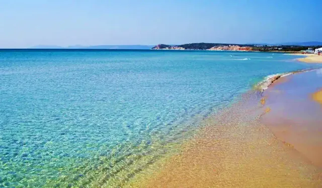 Adını ışıl ışıl parlayan kumlarından alıyor: Berrak ve serin suyu ile İzmir'in en güzel plajlarından biri