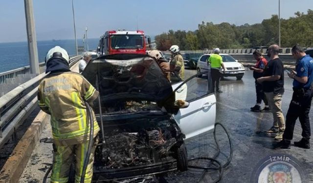 İzmir trafiğinde araç alev aldı: Güzergah kilitlendi, soğutma çalışmaları sürüyor